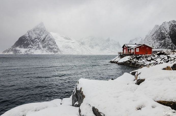 Red house in the snow Photo by Tzvika Stein #inspiration #red #house #snow #photography