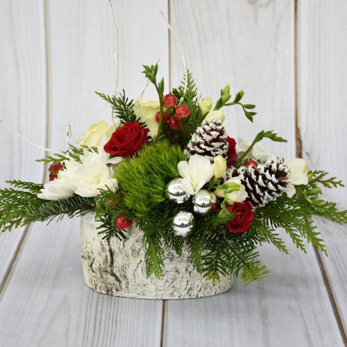 TIS THE SEASON OF GENEROSITY & APPRECIATION- SHOW THAT SPECIAL SOMEONE WITH THIS BIRCH BOWL ARRANGEMENT OF WHITE AND RED ROSES, HYPERICUM BERRIES AND CHRISTMAS GREENS