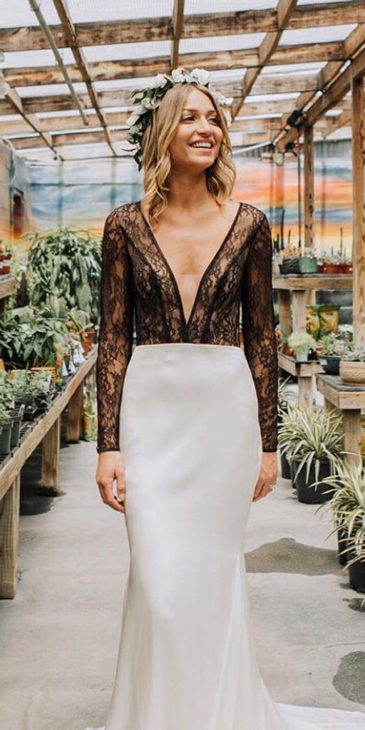 A bridal dress with black lace, patterns or belts will be a great idea, besides this gowns look feminine and elegant.
