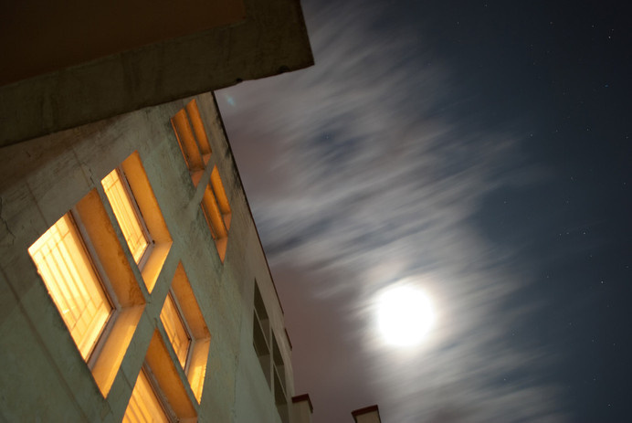 IG065 #clouds #in #motion #building #against #moon