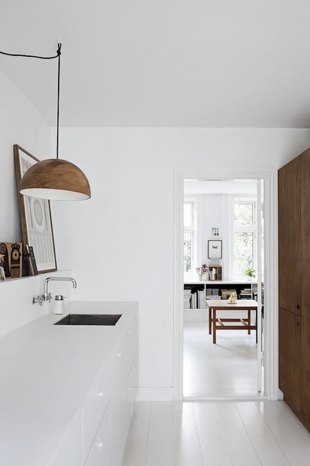 White kitchen with wood accents. #kitchen