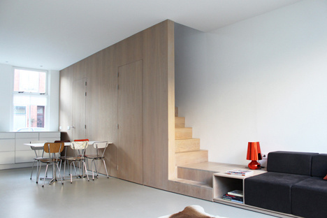 8A Architecten renovate house with combined staircase and sofa #interior #stairs