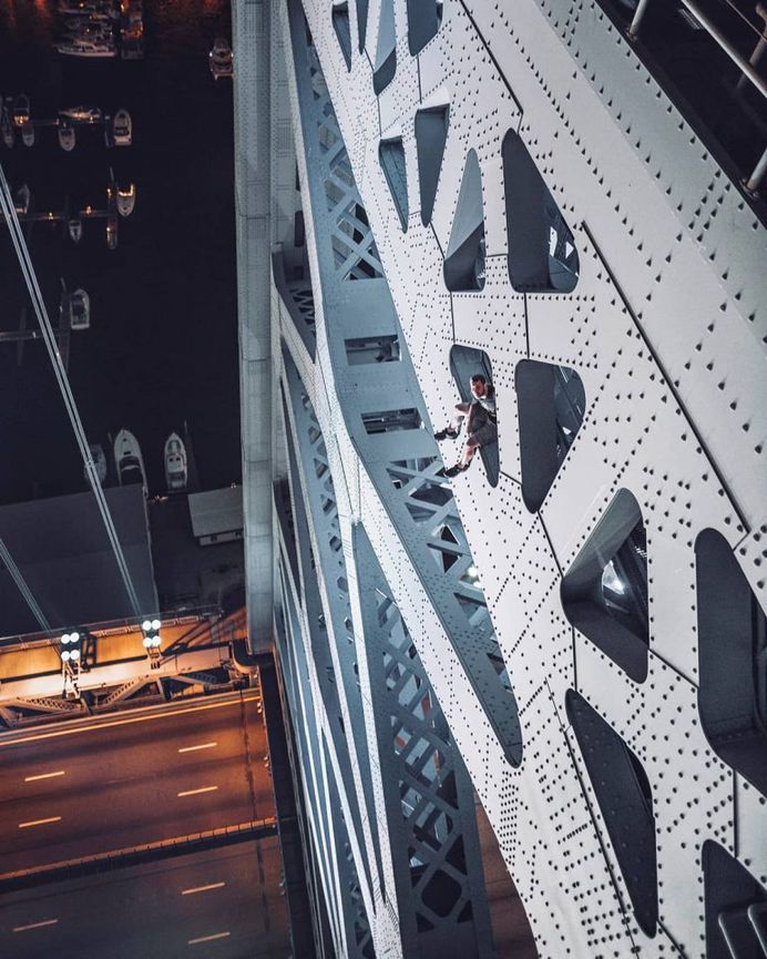 Daredevil Photographer Denis Krasnov Climbes Huge Skyscrapers To Take Stunning Photos