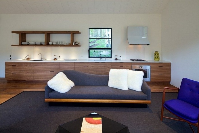 Cottage Black Provides a Retreat Within a Dense Aspen Grove 7