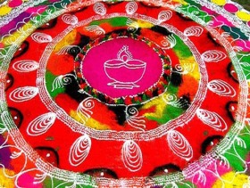 Centered diya rangoli design