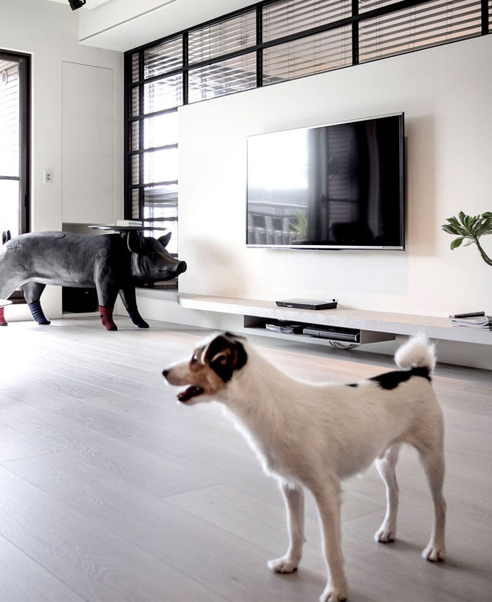 Dark and Moody Apartment Interior big sculpture pig #interior #decor #living #pig #home #colors #dark #room