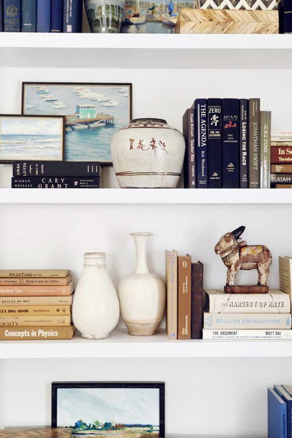 inspiring shelf styling from betsy burnham design. #shelfie #shelfstyling #interiordecorating #ceramics #vintagedecor #vintage #decor #shelving #bookshelves #bookcase #betsyburnham #styling