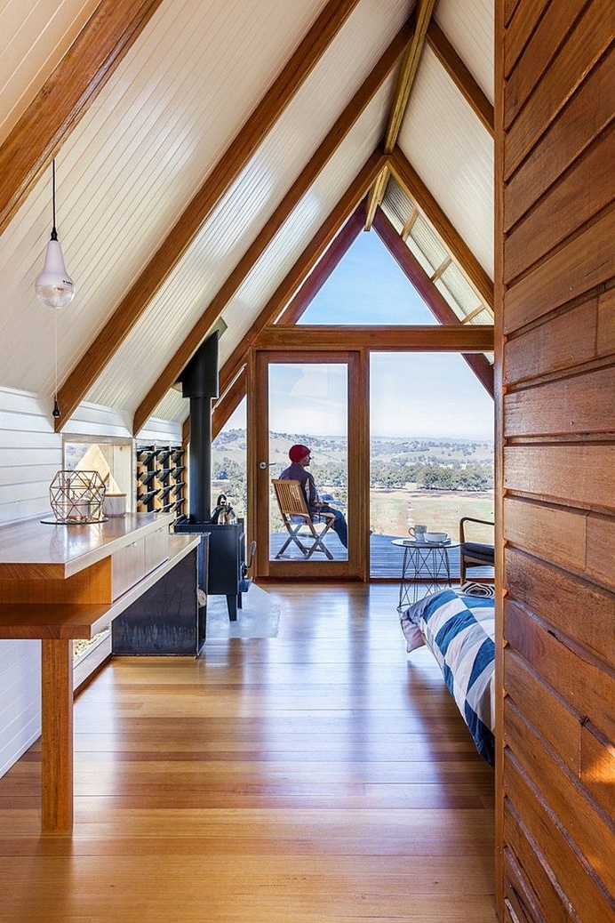 Kimo Hut is an A-Frame-Tent Shape with Two Open Ends and a Corrugated Metal Roof 3