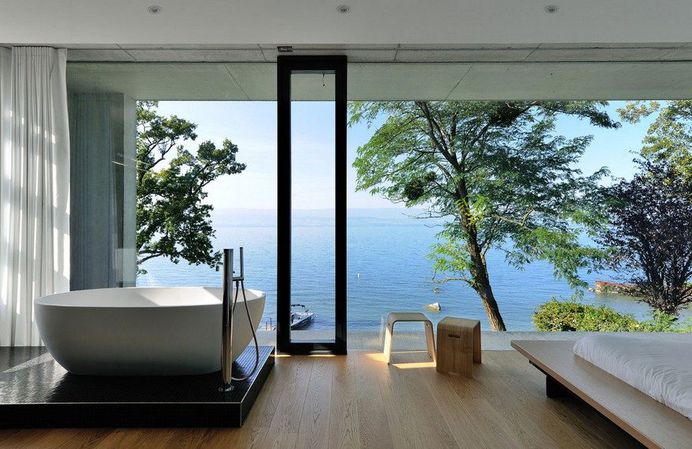 Contemporary Lake House Made Entirely of Raw Concrete 8