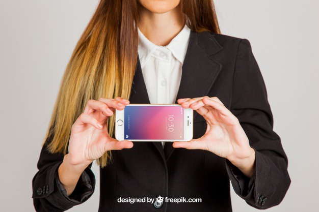 Business woman holding smartphone with two hands Free Psd. See more inspiration related to Mockup, Business, Technology, Template, Woman, Girl, Hands, Presentation, Smartphone, Mock up, Modern, App, Business woman, Female, Young, Device, Up, Businesswoman, Holding, Showcase, Stylish, Showroom, Two, Mock, Presenting and Showing on Freepik.