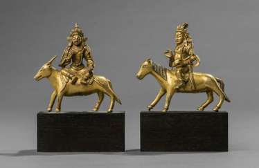Two fire-gilded bronzes of deities