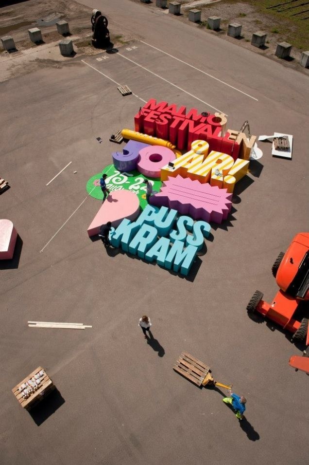 Cool 3D poster is made with letters so big that they can crush a human #big type #wood #installation