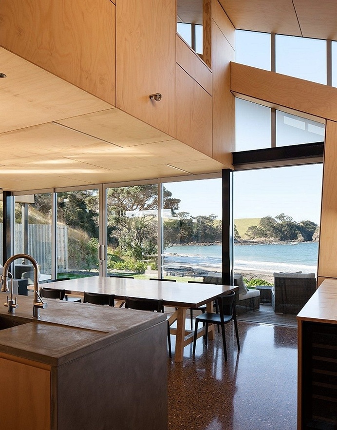 Rusted Steel Cladding House with Crafted Interior Finishes 3