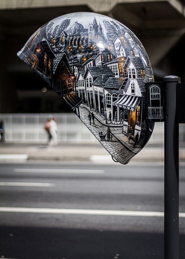 Exterior of creative phone booth with town painted outside #phone #public #booth #art #street #exterior #telephone