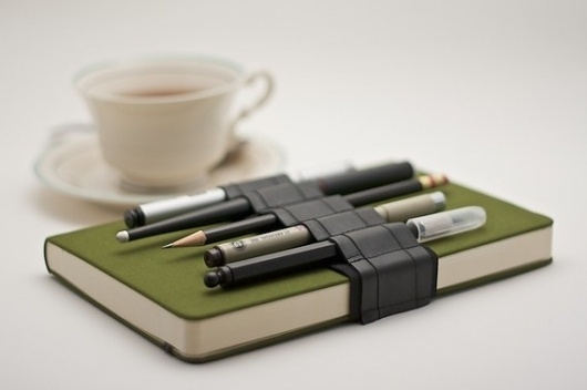 Journal Bandolier recycled rubber keep track of by cleverhands #rubber #pens #book #sketchbook #recycling #pencils #notebook #holder