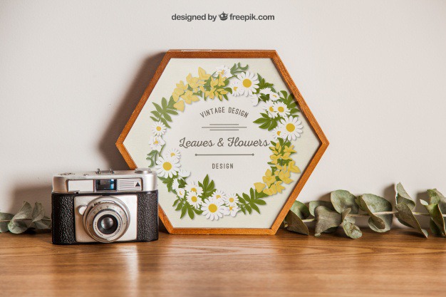 Hexagonal frame mockup with camera Free Psd. See more inspiration related to Flower, Frame, Mockup, Floral, Wood, Template, Camera, Table, Floral frame, Mock up, Plant, Decoration, Creative, Flower frame, Interior, Plants, Decorative, Wooden, Creativity, Pot, Up, Decor, Wood frame, Wooden table, Flower pot, Hexagonal and Mock on Freepik.