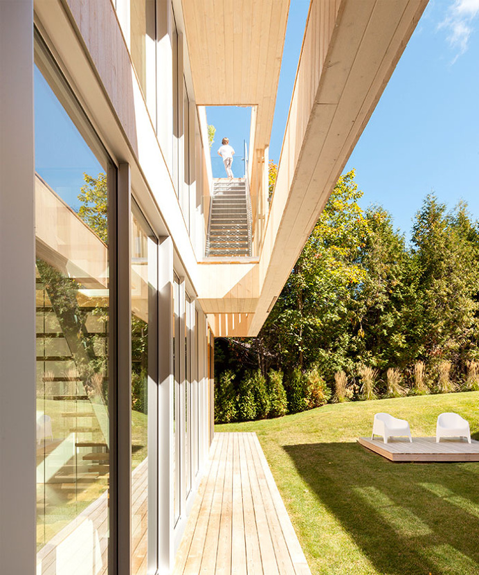 Atelier Pierre Thibault Constructed Wooden Property for Family Vacation - InteriorZine