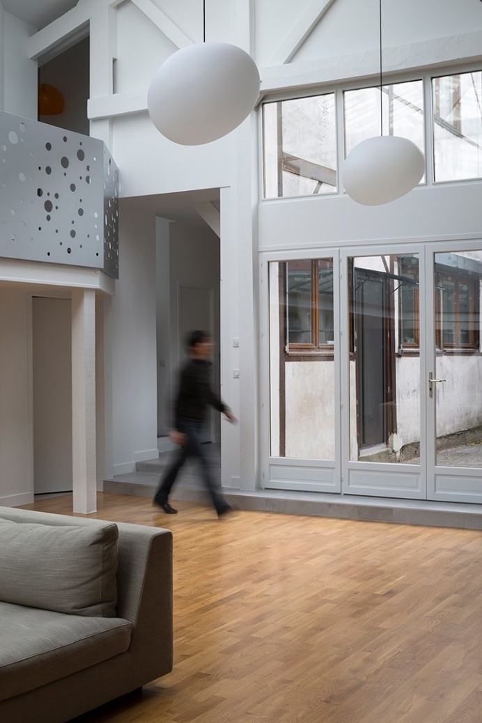 Old Carpentry Transformed into a Light-Filled Loft