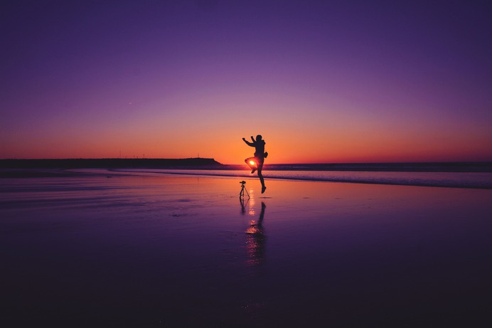 silhouette of man on beach