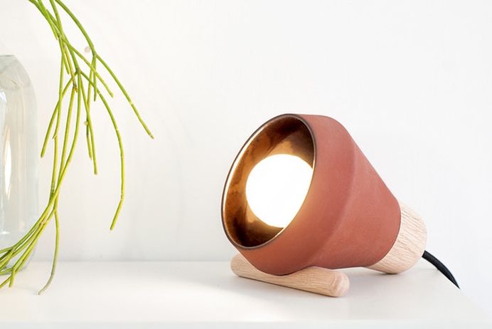 Mexico Creates: Ensemble Table Light - IPPINKA Ensemble Lamp was largely inspired by Mexico City, a city filled with a cultural vibrancy which sparked their artistic fervor. Thus, the materials used evoked elements of Mexico, from the warm sienna tones of the earth to the natural wood grain. Additionally, just as FRAME themselves are parts coming together as a whole, the entire concept behind Ensemble merges together the old and the new. It is minimalist design fusing with old world traditions of craftsmanship.