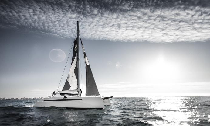 yacht on the sea #sailboat #ocean #traveling #alibi #water #sky #design #yacht #travel #catamaran #sailing #sea #boat #blue #alone #grey