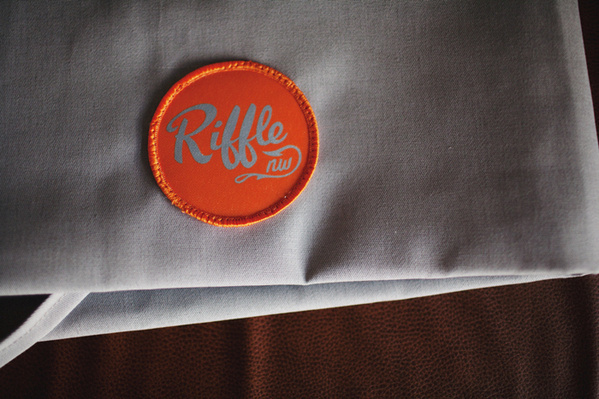 RIFFLE NW on Behance #riffle #badge #design #orange #nw #uniform
