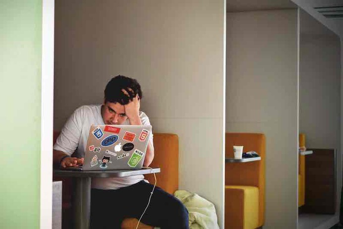 Frustrated man with computer