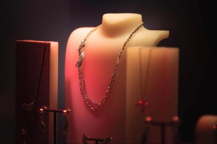 Sure, a white background is a safe bet when it comes to jewelry  shots but jewelry is personal.

Try adding context or drama on your next shoot. 