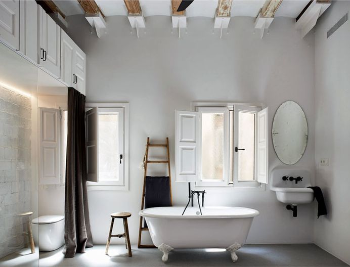 Brick Walls and Wooden Roof Structures Give Character to Barcelona Apartment #bath #interior #decor