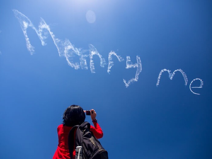 Propose by skywriting