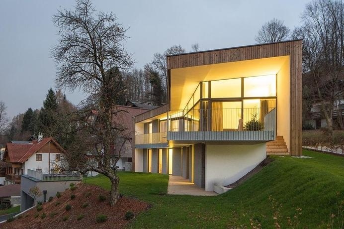Simple Geometric House with Two Profiles: House T in Salzburg, Austria #architecture