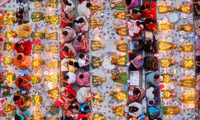 Praying with food by Noor Ahmed Gelal