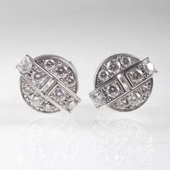 Pair of brilliant stud earrings by Cartier