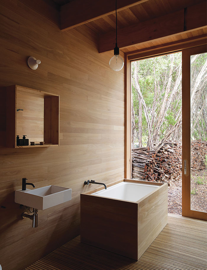 Dwell: "Local Wood Covers This Getaway for Two Architects"