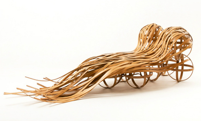 The "Flow" bamboo chair is made from 100% renewable bamboo, and is uniquely designed to resemble a cloud blowing in the wind. #design #produ