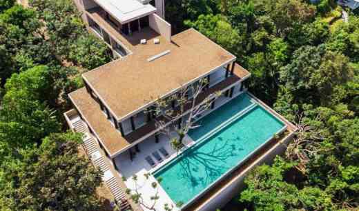 Presenting one of 5 bedroom Phuket's latest luxury villas, with impressive sweeping views overlooking the infinity pool and beyond out to Kamala beach. Book with Villa Getaways.