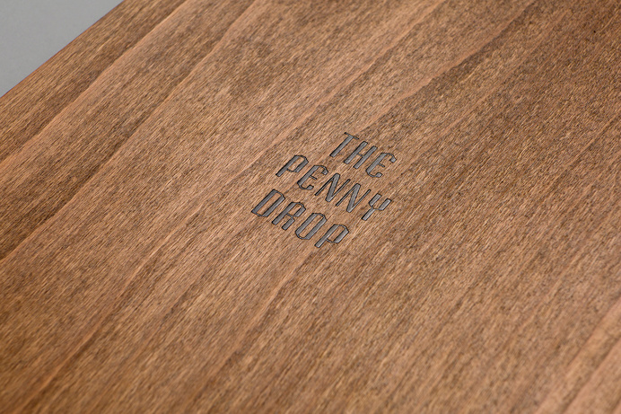 the penny drop cafe by pop and pac melbourne australia beautiful interior design branding logotype copper wood graphic modern coffee inspira