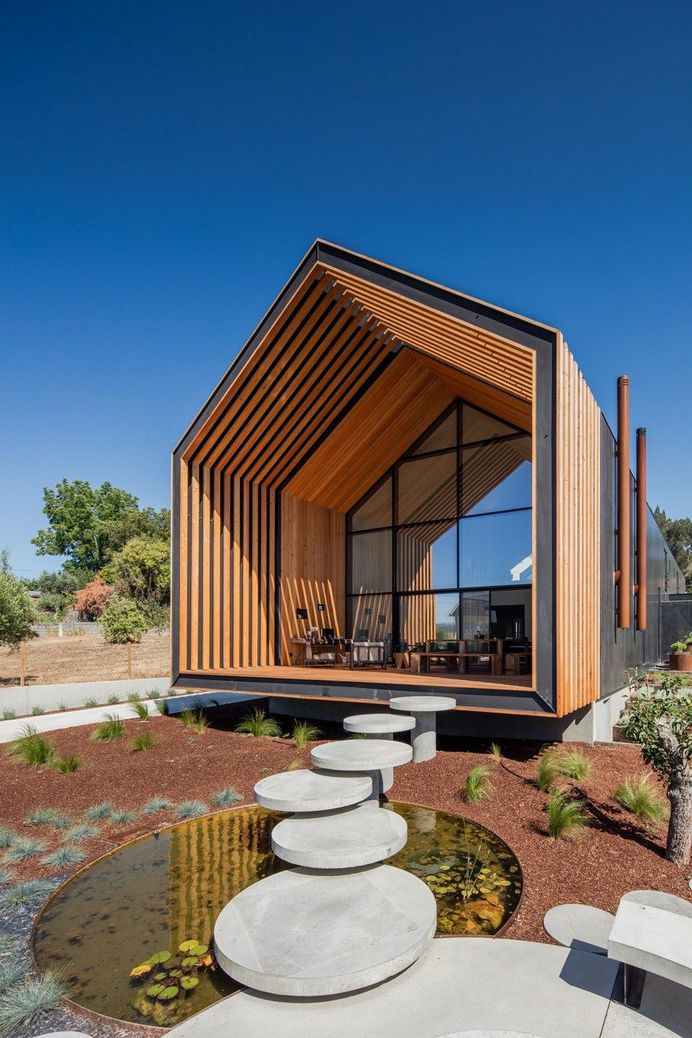 Beautiful Monolithic Home Built of Prefabricated Black Concrete Panels 2