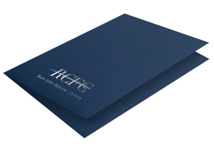 Silver Foil Stamped Presentation Folders on Green Linen