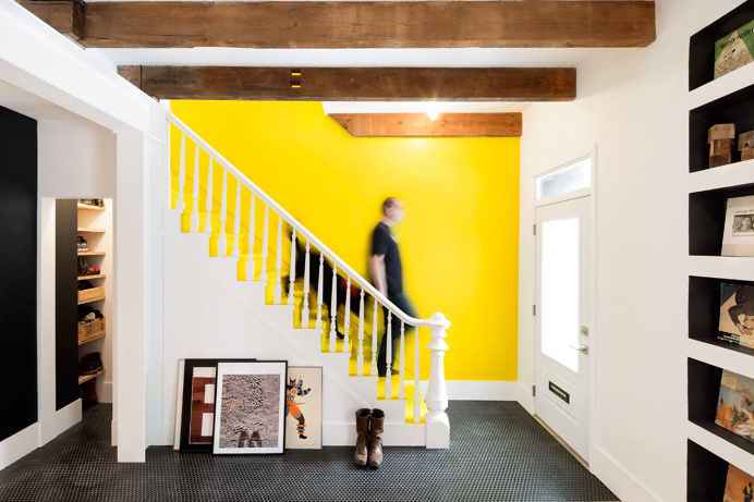 HISTORICAL ROW HOUSE GETS A WHIMSICAL, INDUSTRIAL RENOVATION