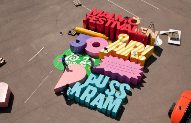 Cool 3D poster is made with letters so big that they can crush a human #type #big #wood #installation