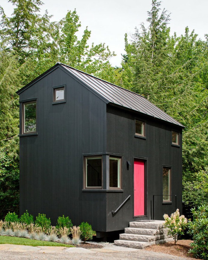 A modest cabin is rebuild on its former footprint 3
