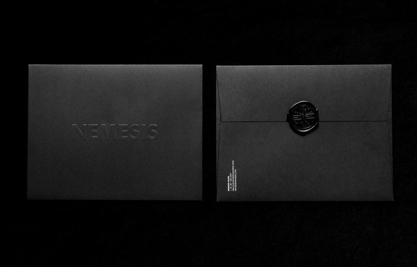 Logo and envelope with a wax seal and blind embossed detail designed by Anagrama for Latin American horror film production company Nemesis F #collateral #branding