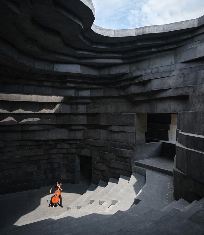 Chinese studio Open Architecture unveils Chapel of Sound, a sculptural open-air concert hall in the forests of Jinshanling