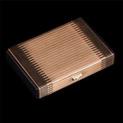 Gold cosmetic bag with diamonds from Cartier