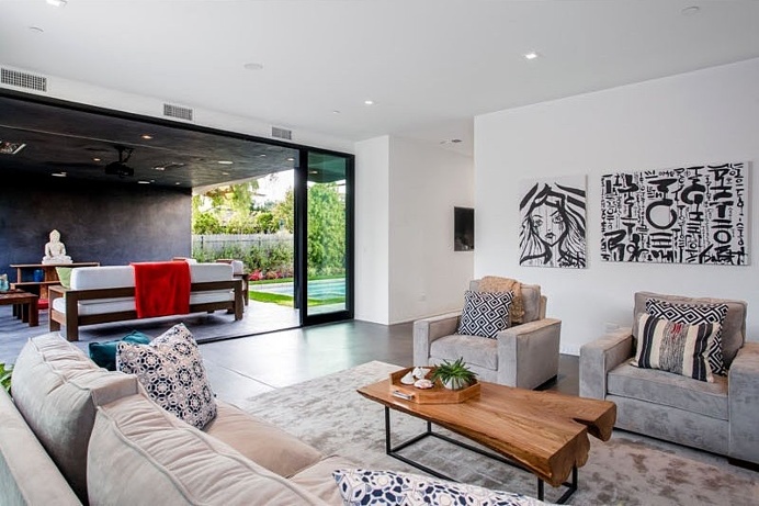 The Wave House by Mario Romano is Encased in White Aluminum