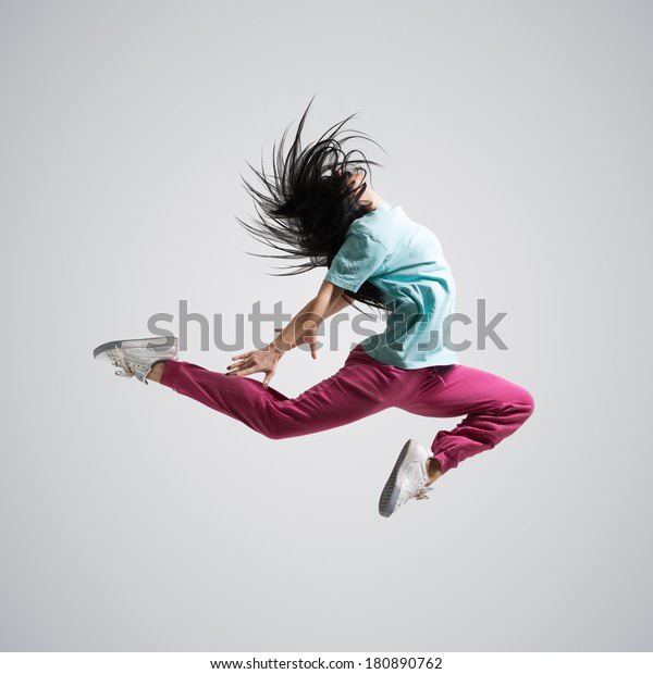 beautiful athletic girl dancing jumping