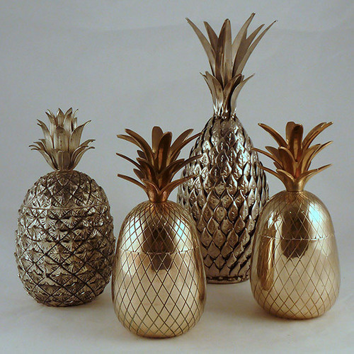 a group of 1960s large brass and silver metal pineapple ice buckets. #art #gold #1960 #pineapple #bucket