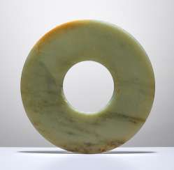 A RARE THIN POLISHED BI DISC