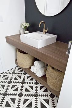 This old, dingy bathroom gets a massive overhaul into a modern, sophisticated space in just 6 weeks. See the one room challenge reveal!